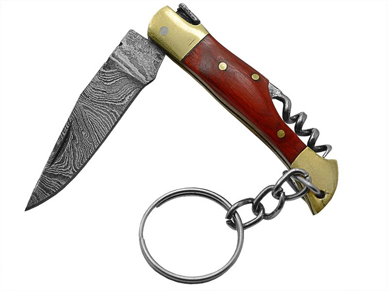 Canivete para colecionador forjado em aço damasco. Empunhadura em pakawood, 11 cm