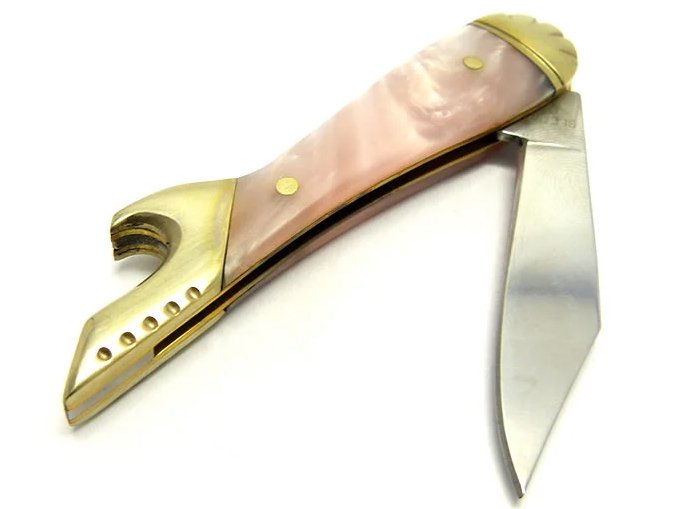 Imperial Schrade canivete com uma lâmina em aço inoxidável e empunhadura em celulóide rosa 13 cm